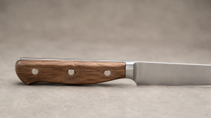 Wood-handled knife shown for visual context.